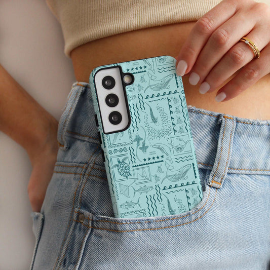 Samsung Phone Case in teal with ocean-themed busy print featuring marine animals, tough protective design.