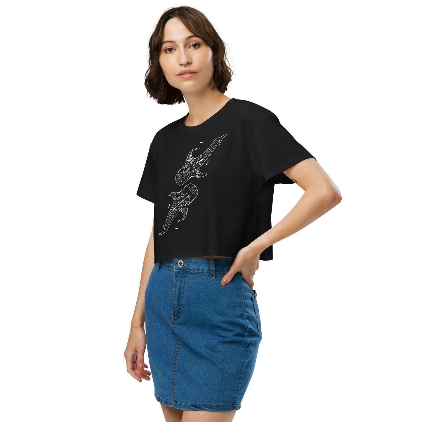 Women's black crop t-shirt with whale shark line art design, soft combed cotton fabric, paired with denim skirt