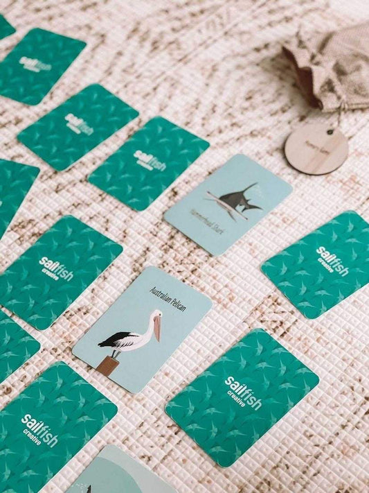 3 Games in 1 card set featuring Go Fish, Snap, and Memory Game with ocean-themed illustrations in a jute bag