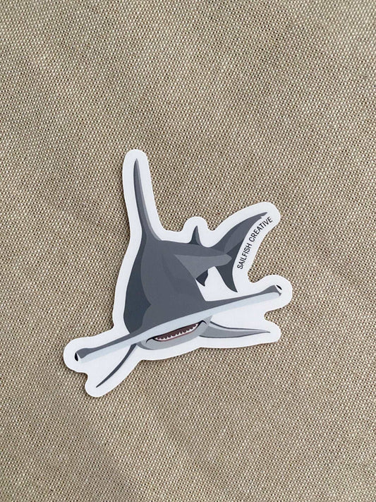 Hammerhead Shark sticker on beige textured surface, durable matte vinyl design