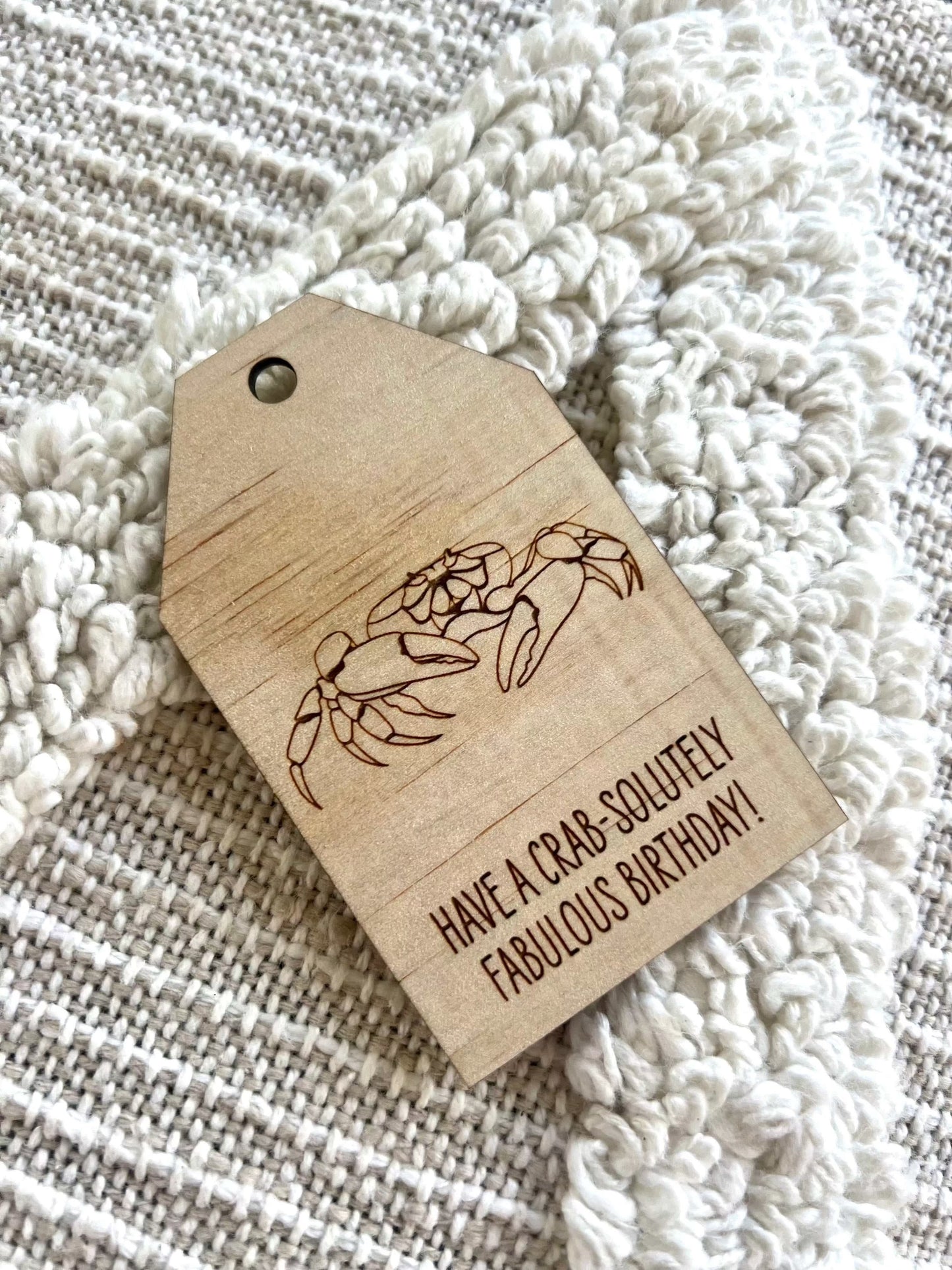 Wooden Birthday Gift Tag with engraved red crab design and birthday message on plywood