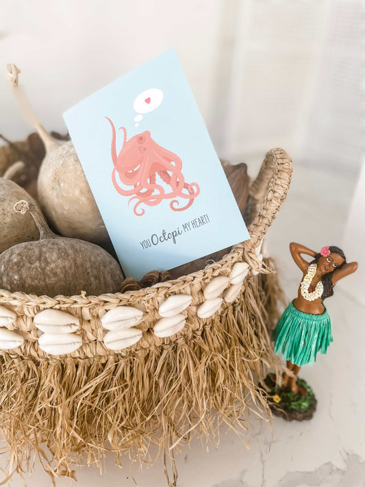 Lovers Card - Octopus greeting card with cute pink octopus illustration and love heart message in woven basket with tropical decor
