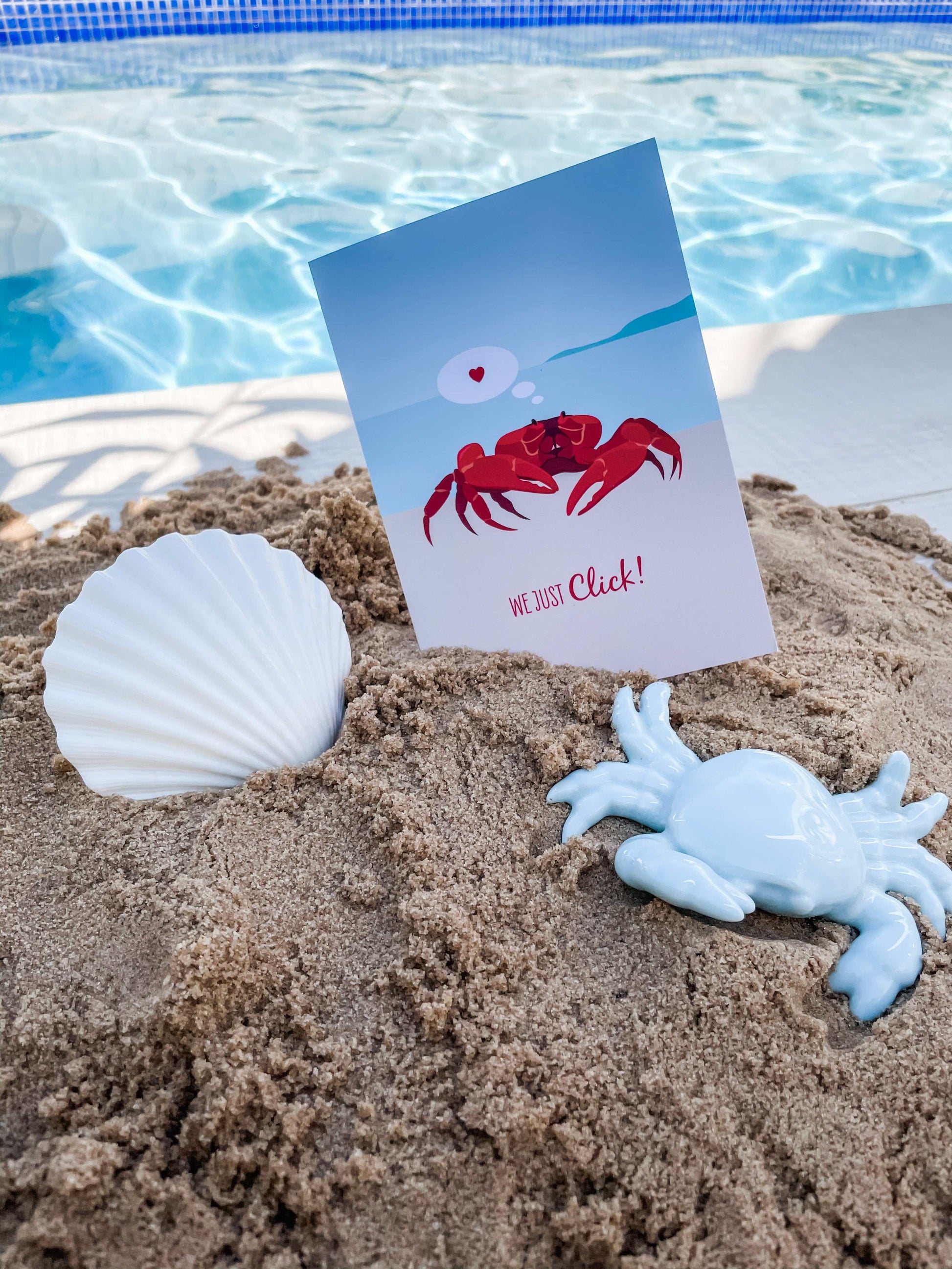 Lovers Card - Red Crab greeting card with digital red crab illustration on beach sand near pool with seashell and crab decor