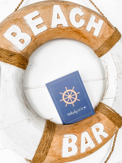 Lovers Card - Ships WheelThis funny Ships Wheel Nautical greeting card with envelope is the perfect way to send an ocean lover some love.
DETAILS:

Digital illustration and design
Printed onGreeting CardsSailfish Creative