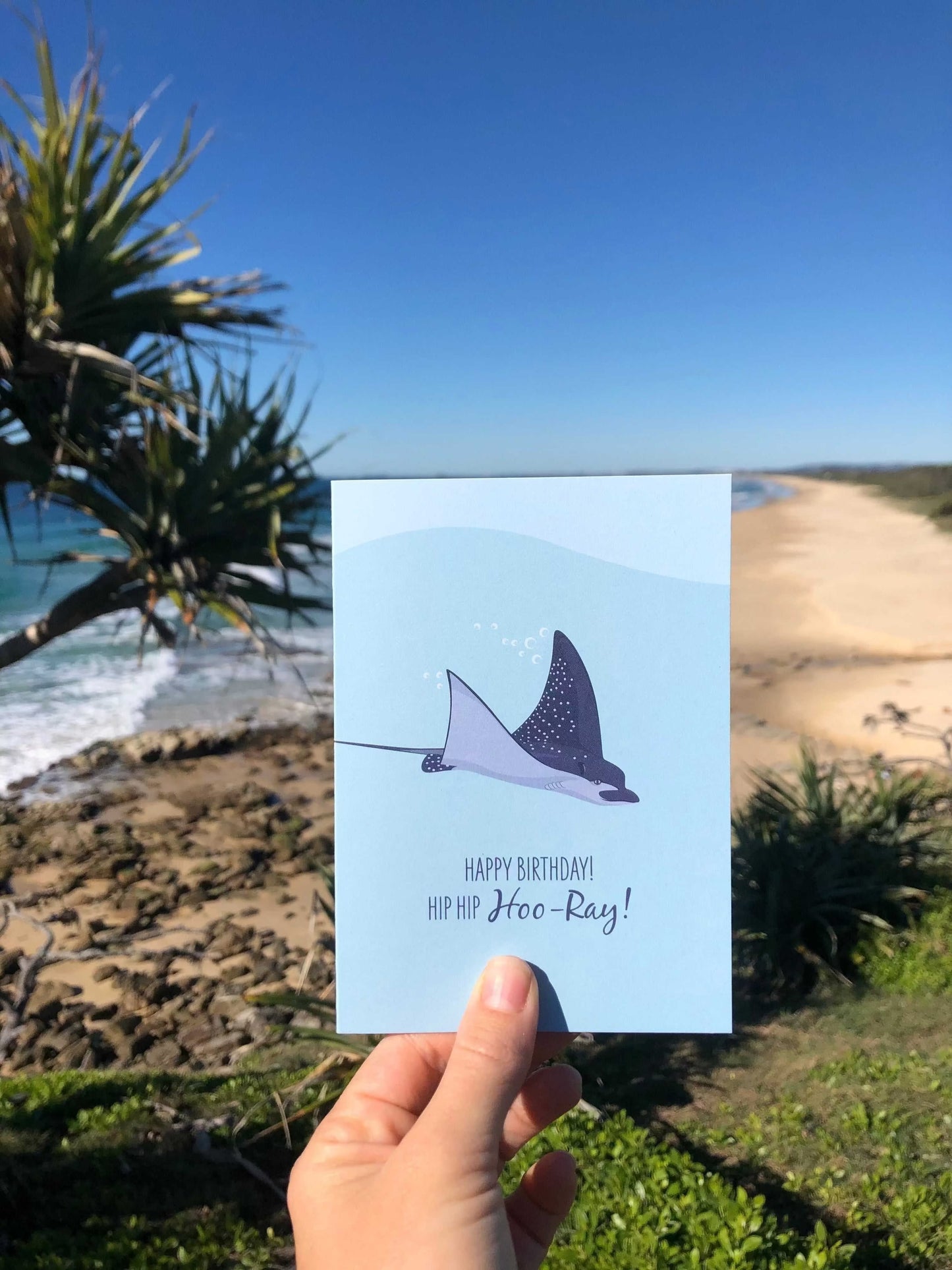 Spotted Eagle Ray birthday card with ocean background and birthday message